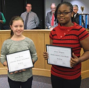 Fifth-grade students from S.P. Morton Elementary School Emily Benton, left, and Nacari Wiggins were presented with awards at the last Franklin School Board Meeting. Benton was the number one scholar in the nation for reading in the Pearson SuccessMaker Program in the month of November, and Wiggins was for the month of October.