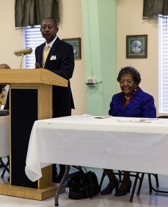 Franklin Sportsman's Club President Herman Charity gives a welcome speech to those at the annual Hayden Reunion Breakfast while honoree Marie Giles Chestnutt listens.