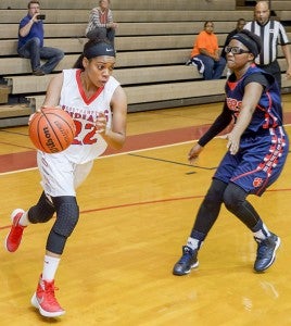 Southampton’s Bryona Knight drives the lane against a Charles City defender. -- Murray Thompson | Tidewater News