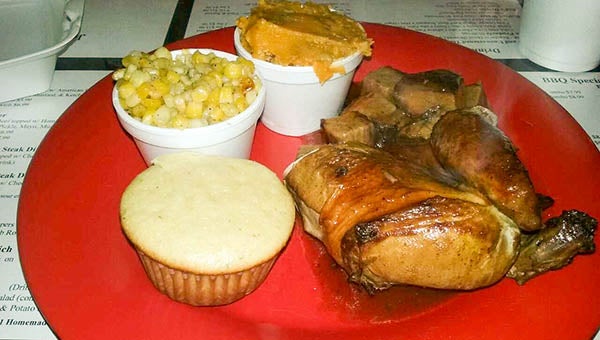 The Double Delight Dinner at Jeb’s Diner include chopped brisket, bone-in chicken, fried corn and sweet potato casserole. -- Sameerah Brown | Tidewater News