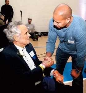 Former Chowan player Ray Henderson offers words of thanks to his former coack, Bob Burke, at a reception held Saturday night at the Jenkins Center in Murfreesboro, North Carolina.-- CAL BRYANT| ROANOKE-CHOWAN NEWS-HERALD