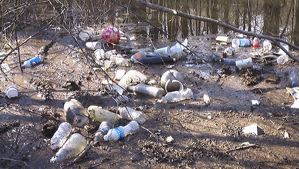 Trash carried along the Franklin stormwater canal that connects to the Blackwater River. -- SUBMITTED | JEFF TURNER