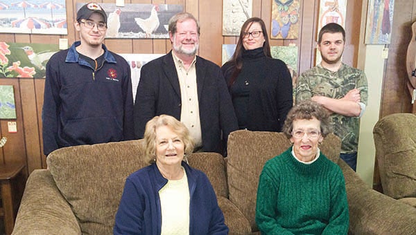 The staff of the renowned furniture store, Nottoway House Inc., features Frances Gladding and Pat Cleveland, both seated left to right; Standing on either side are Nick Grizzard and Austin Brown, deliverymen. Collin Pulley, left, and Jamie McFarland are between. -- Stephen H. Cowles | Tidewater News