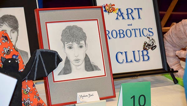 The STREAM Art and Robotics Club at J.P. Jr. King Middle School showed off the art work they made and the robots they had built this year during the expo on Wednesday. -- Rebecca Chappell | Tidewater News