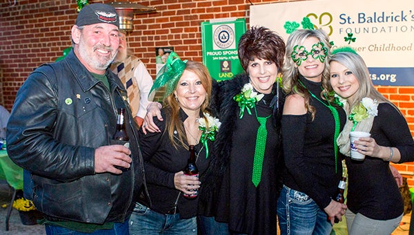 The St. Baldrick’s event will be at Fred’s restaurant on Saturday, March 26. Team Naomi raised more than $18,000 for the childhood cancer research charity at the event last year. Pictured from left are Dan Kriseler, Gail Kriseler, Naomi Koontz, Lori Cary and Taylor Vick. -- FILE PHOTO
