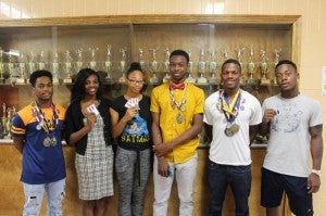 Members of the Franklin track team pose with their VHSL medals and certificates. -- SUBMITTED