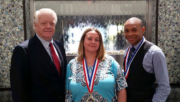 Dr. Bill Aiken, interim president of Paul D. Camp Community College, was on hand to congratulate Brandy Main and Ellis Cofield III at the Phi Theta Kappa Honor Society Awards Luncheon. -- SUBMITTED