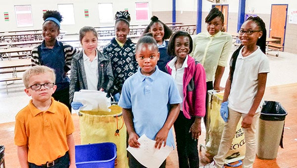 Second graders from Stephanie Neupert’s class at S.P. Morton Elementary School participate in recycling program that has been going on for nearly 20 years. This program is something that students at all three Franklin schools are a part of. Pictured from left are Anaiyla Cherry, Julianna Perea, Jakayla Brown, Akayla Bynum-English, Nadia Smith-Milian, Ladesha Warren, Timothy Wetterstron, Simiyah Norfleet and Niyah Wilson. -- SUBMITTED