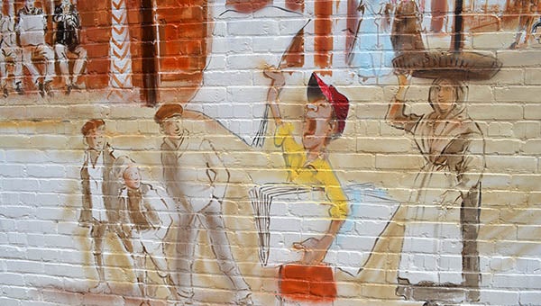 The Downtown Franklin Association has created a new project where past, present and future murals that depict Franklin will be painted throughout downtown. -- Mitzi Lusk | Tidewater News