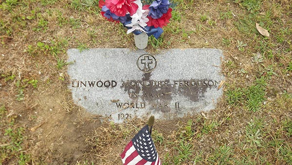 At the Hollywood Cemetery in Newsoms, the flag and the inscription on the marker of Linwood Moncure Ferguson (March 14, 1921 - April 14, 1986) tell only a fraction of this World War II veteran’s life. Nearby is the grave of Lewis T. Ferguson (March 8, 1914 - June 15, 1971), also of World War II. -- Stephen Cowles | Tidewater News