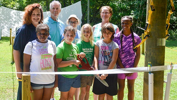 Pictured, from left to right in back, are Tracy Keller, Thurston Watkins, Girl Scout Riley Higgins, Carol Watkins; front: Scouts Asia Williams, Lillie Ridger-Hughes, Amanda Von St. Paul, Ciera Harkness and Milan Price. -- Walter Francis | Tidewater News