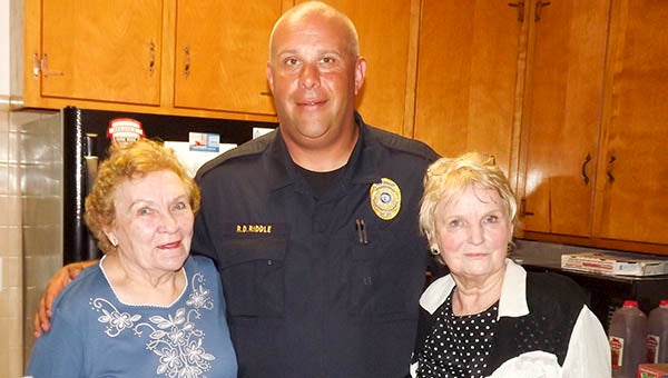 Members of Windsor Baptist Church honored the local police department by making them a meal. Pictured are Windsor Baptist churchgoer Betty Hardy, Windsor Chief of Police R.D. Riddle and Wanda Bishop. -- Walters Francis | Tidewater News