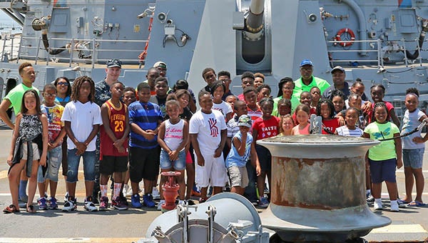The group poses with the staff of the USS Williams on the main deck. -- Submitted | Frank Davis