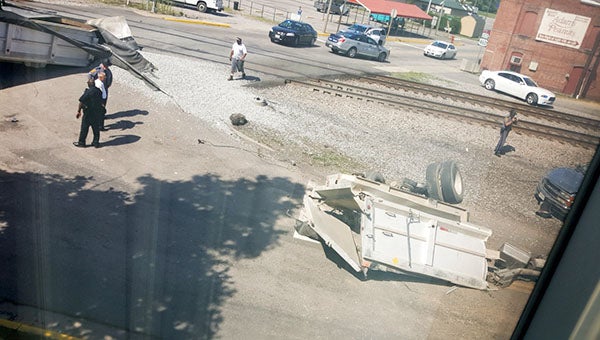 A tractor trailer hauling rocks was struck by a train on Route 40 in the town of Waverly on Thursday afternoon. -- Submitted | Rena Yarbrough