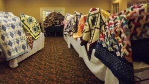 Quilts of varying sizes and styles are displayed at the Village at Woods Edge. The Village Quilters created a total of 46 quilts for the exhibit.