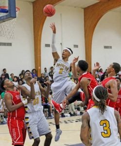Drelyn Ford goes high to release a jump shot.