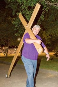 james bowen carries the cross
